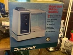 Duracraft Humidifier DH-901 Natural Warm Moisture 2 Gallon 1175 Sq.. Fixed Price $65.99.